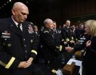 
	WASHINGTON, DC - JUNE 04: Sen. Kirsten Gillibrand (D-NY) (R) shakes hands with Chairman of the Joint Chiefs of Staff Gen. Martin Dempsey as Chief of Staff of the Army Gen. Raymond Odierno looks on following testimony with U.S. military leaders before the Senate Armed Services Committee on pending legislation regarding sexual assaults in the military June 4, 2013 in Washington, DC. A recent survey of active duty personnel by the Pentagon revealed that 6.1 percent of women and 1.2 percent of men reported receiving "unwanted sexual contact" in the past year. (Photo by Win McNamee/Getty Images)
